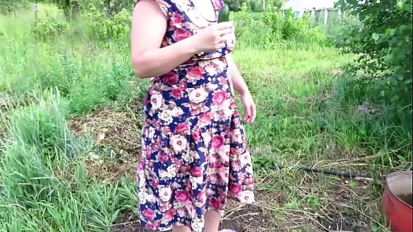 A mature bbw fucks with a cucumber in nature outside the city in public places Her natural boobs and gorgeous booty blend in with the natural landscape أفضل المقاطع الجديدة